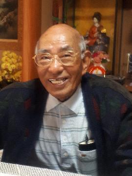 写真:岡本さんが笑顔で話す様子