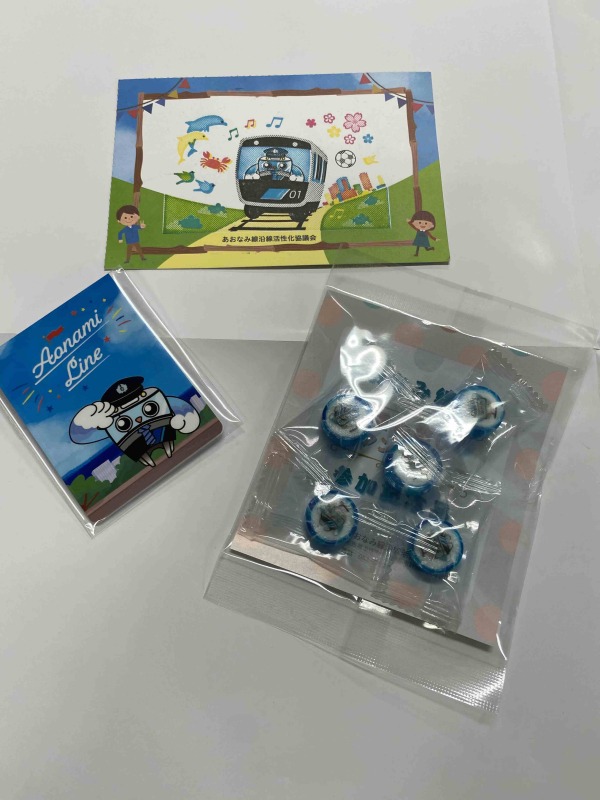 写真：完成絵柄と記念品