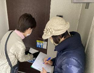 写真：安否確認訓練の様子