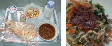 ナンを使用したインド風カレーとビビンバの写真