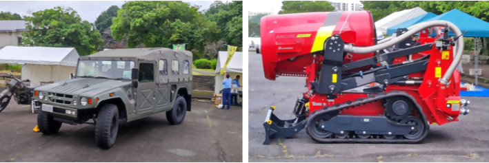写真:乗り物展示・体験の様子(自衛隊車両、ブロアー車)