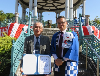 写真：表彰式の様子（竹内さん）