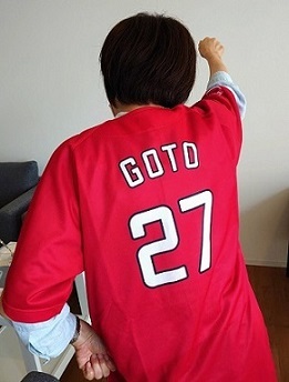 写真：ユニフォーム姿の区長