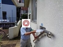 写真：集計結果の投函