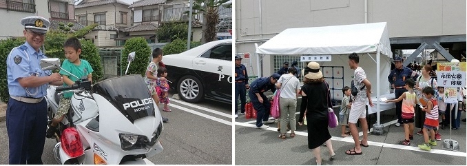 写真：白バイにまたがりカッコいい　消火器体験に力が入ります