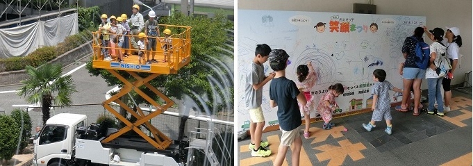 写真：高所作業車の体験　お絵描きコーナーも大人気