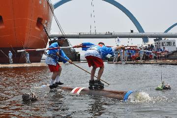 写真:丸太廻し(まるたまわし)