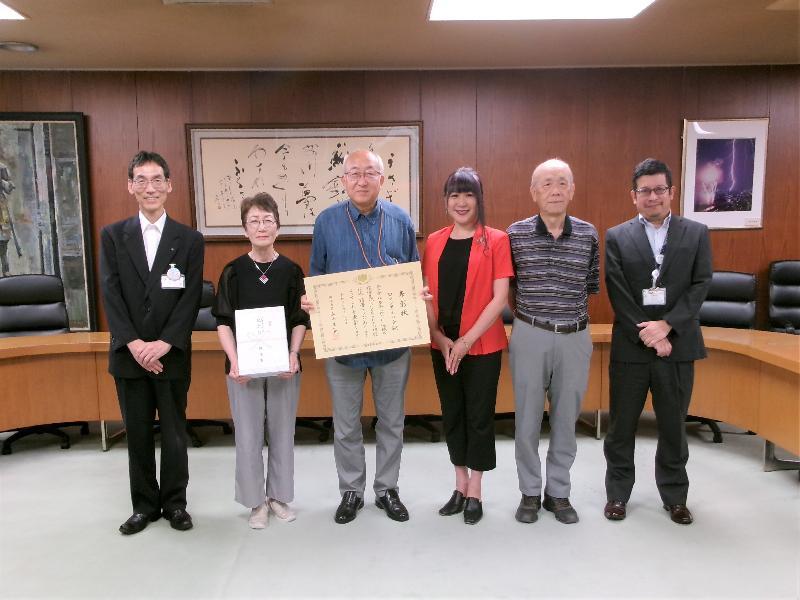 写真:伝達式の様子