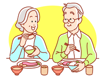 笑顔で食事をする高齢者男女