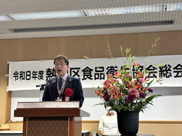 画像：壇上で話をする区長の様子