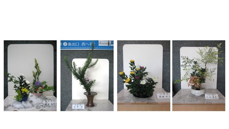 令和8年7月の心の花の写真。1.白色の花と黄色の花の鉢と、紫色の花の鉢の、2つのいけ花。周囲に白い綿と、銀色の星の装飾。2.緑の葉と、薄紫の花を付けた枝もののいけ花。3.黄色の花と、ピンク色の花と、白色の花のいけ花。4.薄緑色の葉と小さな実を付けた枝と、薄赤色の葉と、白色の花のいけ花。