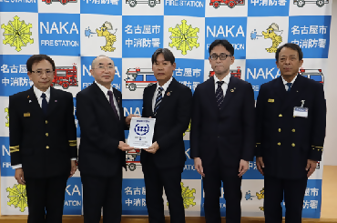 老松学区防災安心まちづくり委員会と北嶋工業株式会社との大規模災害時の支援協力覚書締結の写真