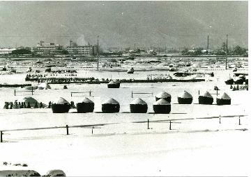 水場川堤防から中沼町、長先町周辺をみたもの（昭和40年撮影）の画像です。ぜひ、一度ご覧ください。