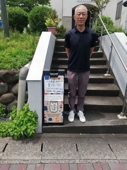認知症カフェの看板と区長
